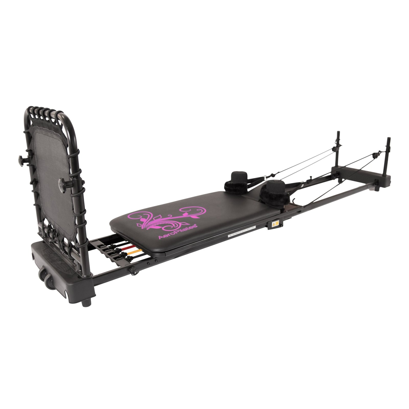 The B-Grade AeroPilates Reformer 435 Plus by AeroPilates is a black pilates machine with a padded sliding platform, resistance cords, foot bar, purple accents, shoulder supports, and a rebounder for versatile exercise routines.